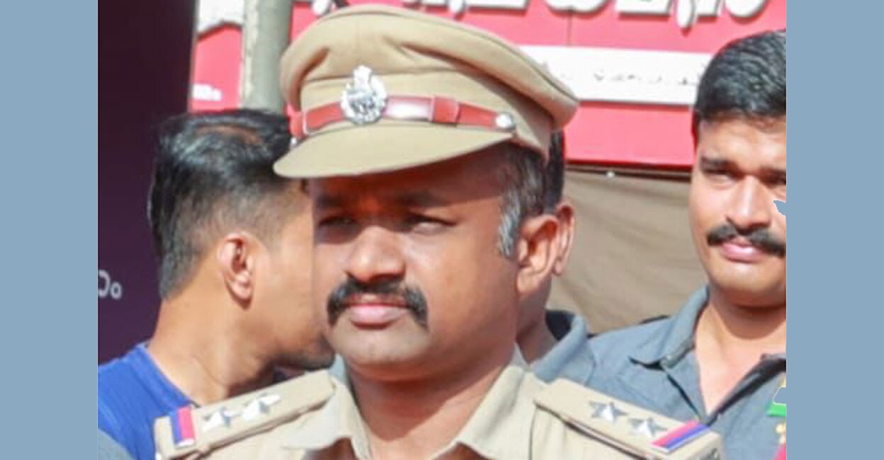 The accused TT Noushad, who was already under suspension, was detained by Crime Branch DYSP Pramod on Tuesday. Photo: Special arrangement. 