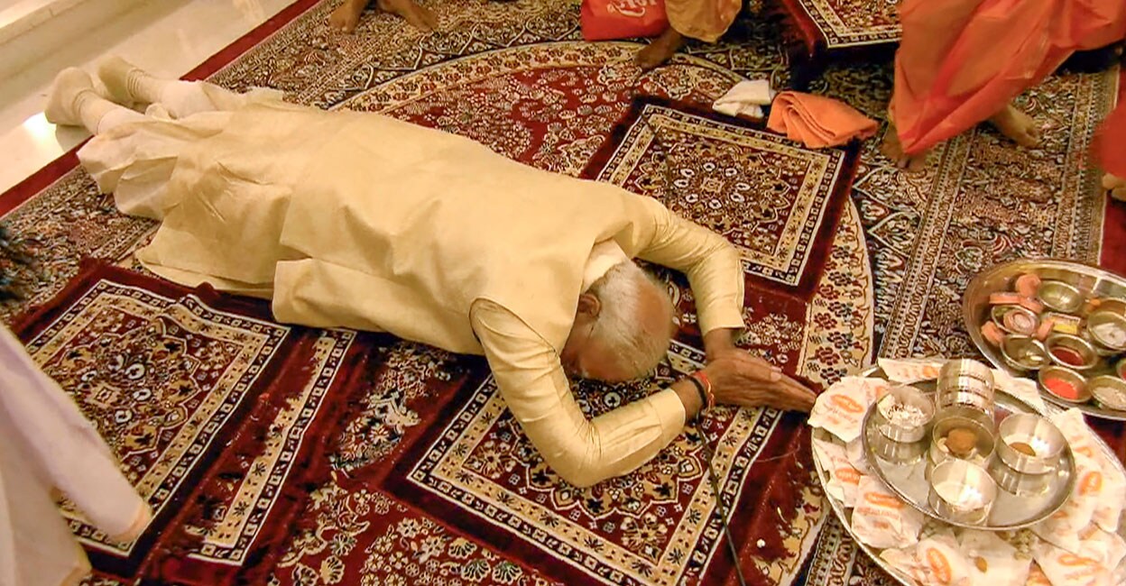 A screengrab from a PTI video shows Prime Minister Narendra Modi prostrate before the idol of Ram Lalla during the 'Pran Pratishtha' rituals at the Ram Mandir in Ayodhya on January 22. 