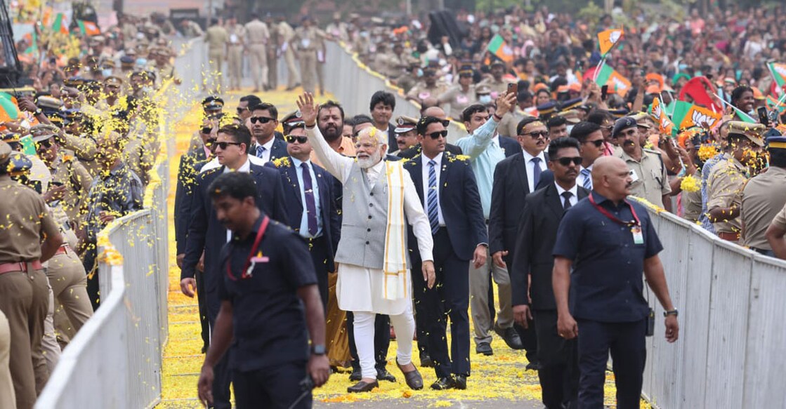 modi-thrissur-bjp-event Prime Minister Narendra Modi waves to BJP supporters as he arrives for the party's Mahila Sangamam in Thrissur on Wednesday. Photo: Special arrangement