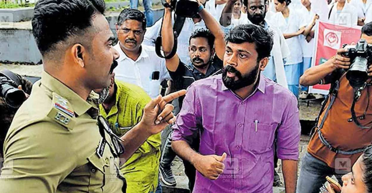 The open verbal tussle between the MLA and the Sub Inspector erupted during the protest of the Kerala Government Nurses Association (KGNA) at Kannur collectorate on Thursday. Photo: Manorama