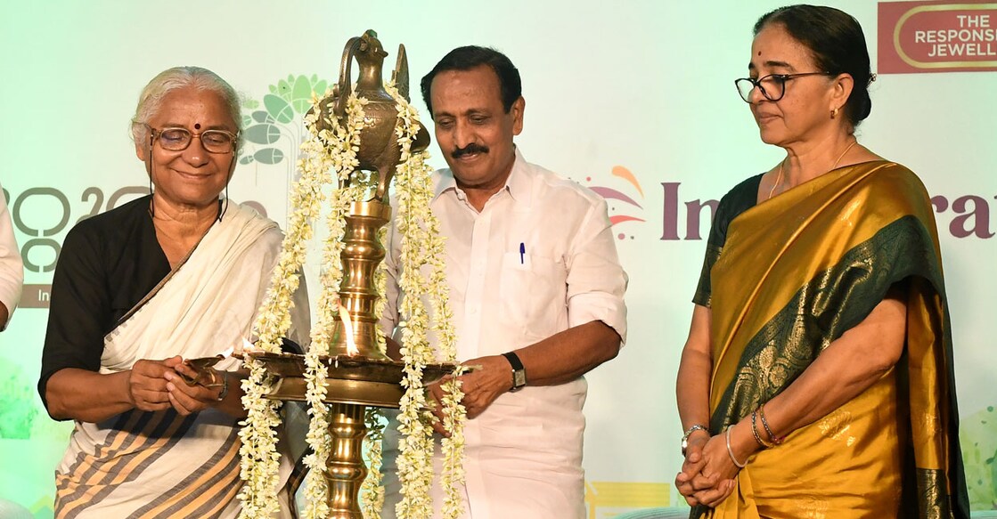 Medha Patkar lights the lamp to inaugurate the Manorama Online – Malabar Gold Chuttuvattom Awards, in the presence of Kozhikode MP M K Raghavan and Mayor Beena Philip, in Kozhikode on Monday. 