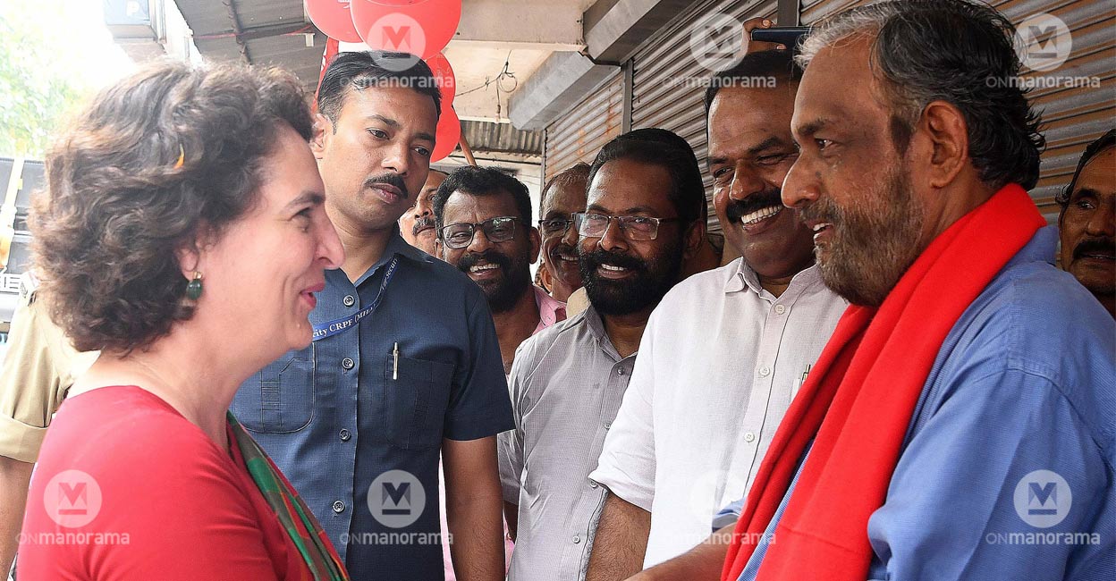 Priyanka Gandhi with CPI's Sathyan Mokeri. Photo: Manorama.
