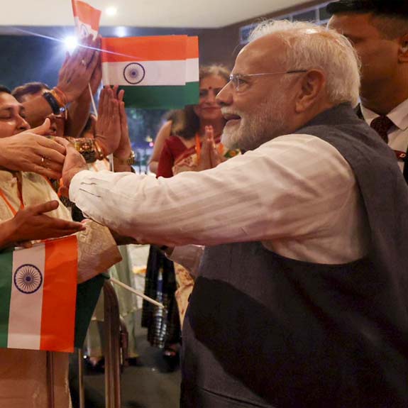 Prime Minister Narendra Modi receives a warm welcome from the Indian community upon arriving in Rio de Janeiro. Photo: PTI