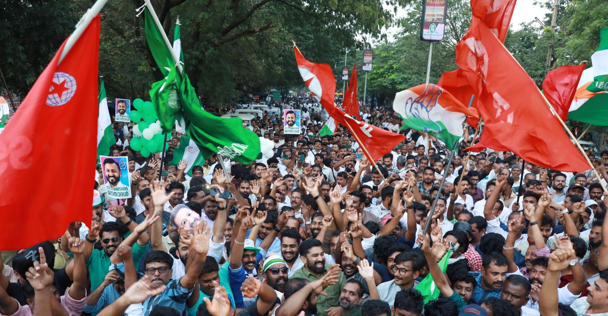 DJ music filled the air, and confetti machines carpeted the streets with colours of the three fronts. Photo: Albin Mathew