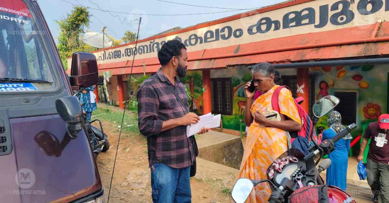 Article Image-Haritha - 4 Manikantan delivers letters to former Chooralmala residents. Photo: Sajesh Mohan/Onmanorama