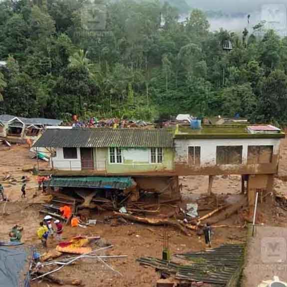 House damaged in landslide at Mundakkai. Photo: Manorama