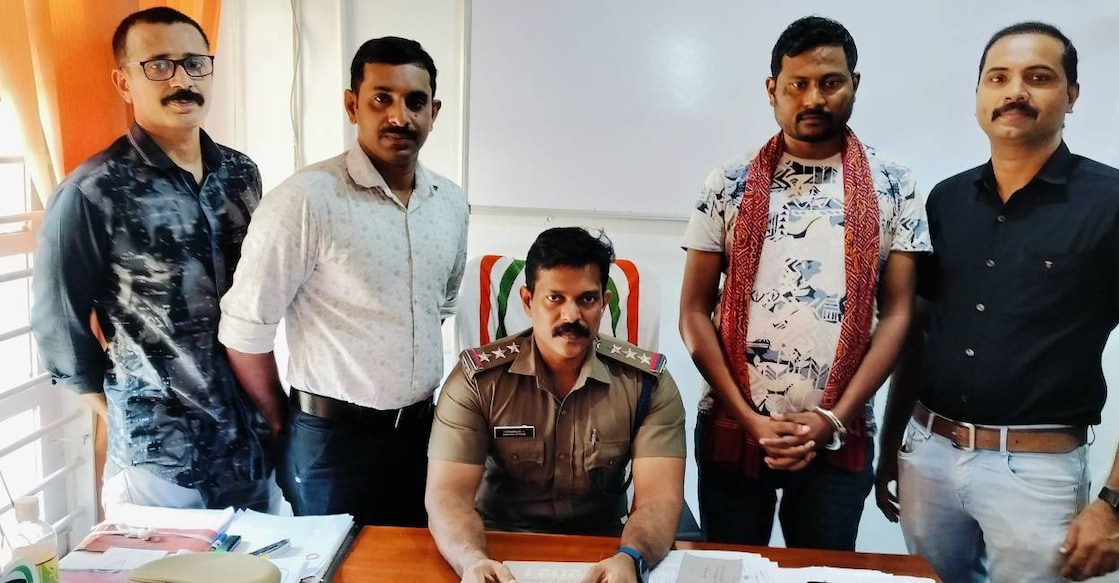 Aneesh Kumar (second from right) with the investigation team under Malappuram Cyber Crime Police Inspector I C Chitharanjan. Photo: Special Arrangement