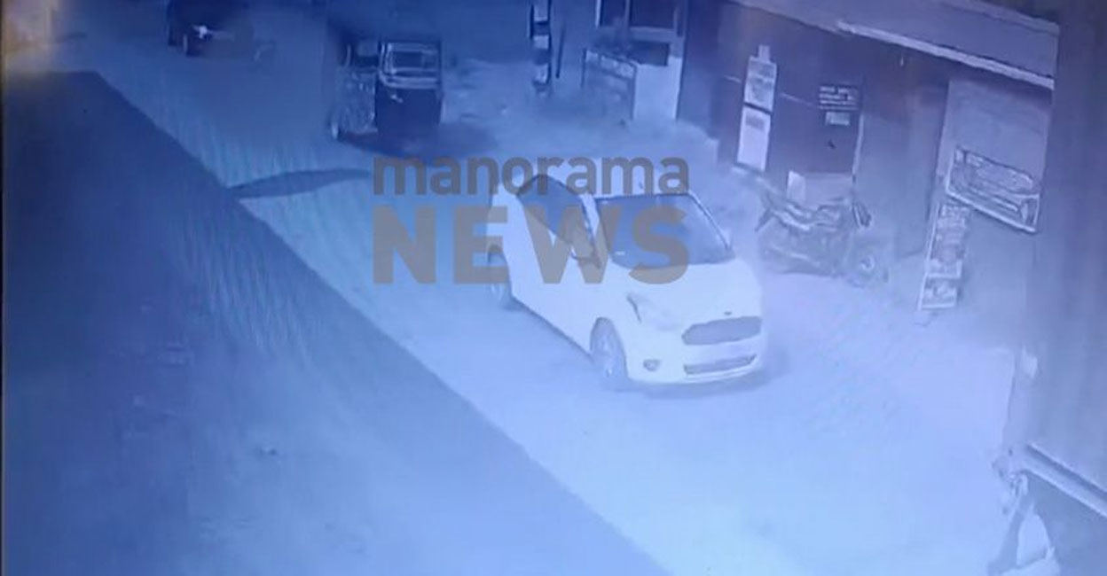 cctv-aluva-kuttamassery-accident Graphic image (viewer discretion advised): The screengrab from a CCTV footage shows the boy (blurred) on the road before being run over by the car.
