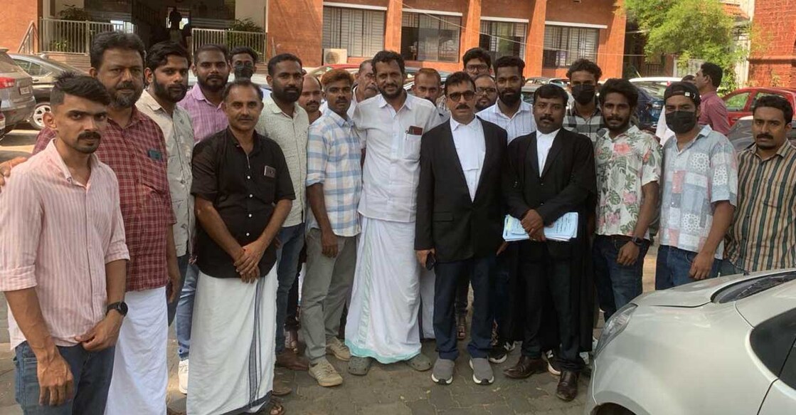 The acquitted people  in GAIL project related case in Kozhikode with Adv.CT Ahmed Kutty.Photo:Special arrangement.