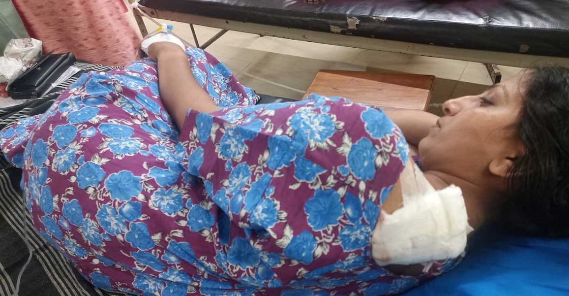 Mayadevi (37), wife of Ragesh, Kaluthara House, Punnapra South, suffered a deep wound on the top of her left shoulder behind her neck. Photo: Special arrangement. 