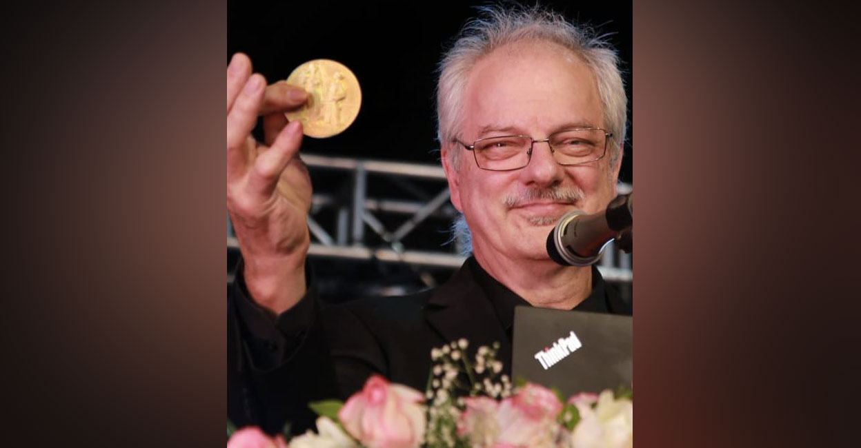 morten-p-meldel-tvm Morten P Meldal shows his Nobel prize medal at the Global Science Festival Kerala in Thiruvananthapuram on Wednesday. Photo: Facebook/@globalsciencefestivalkerala