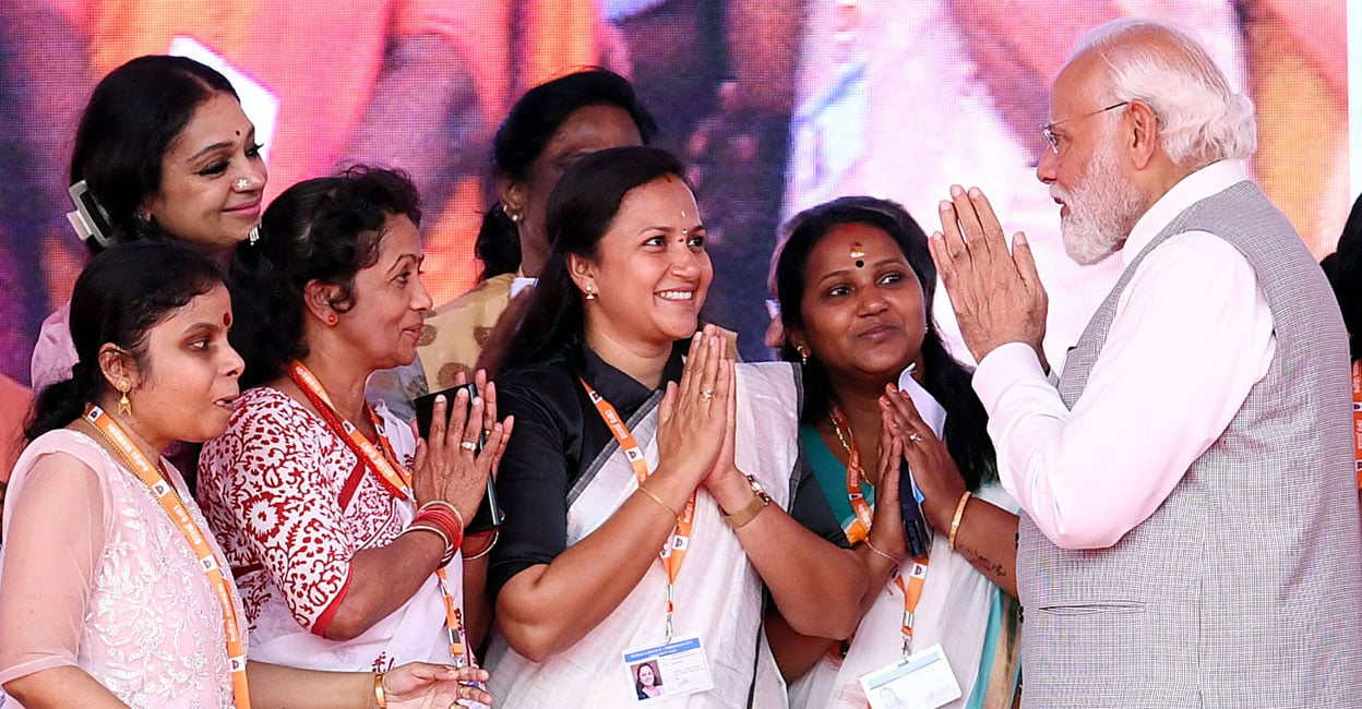 ml-ashwini-modi M L Ashwini (second woman from right) greets Prime Minister Narendra Modi during his recent Kerala visit. Photo: Facebook/@AshwiniML