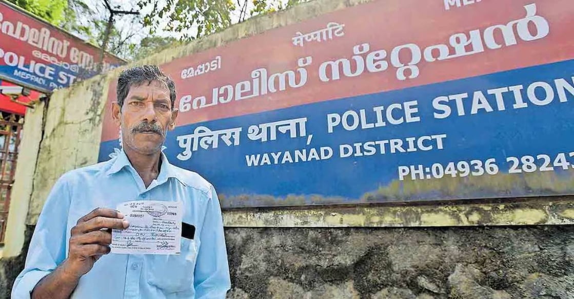 narayanan-autorickshaw-c Narayanan at Meppadi police station after paying the fine for expired vehicle insurance. Photo: Manorama