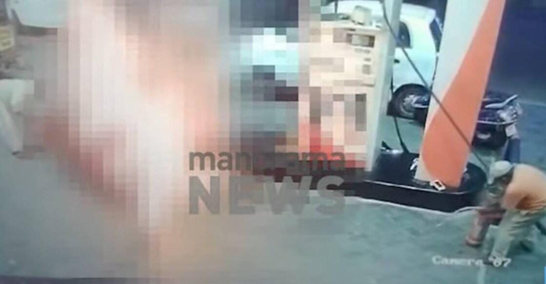 The timely intervention of staff at the petrol pump averted an explosion. Photo: Screengrab/ Manorama News