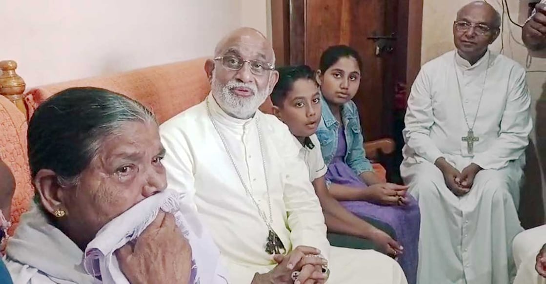 archbishop-raphael-thattil-victims-house Major Archbishop Raphael Thattil consoles the family of Panachiyil Ajeesh, a victim of elephant attack. Photo: Special arrangement