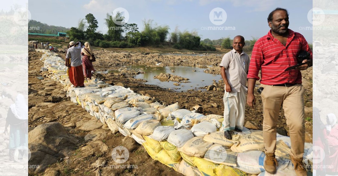 More than 800 volunteers participated in the construction of a check dam across the Kabani River. Photo: Special arrangement