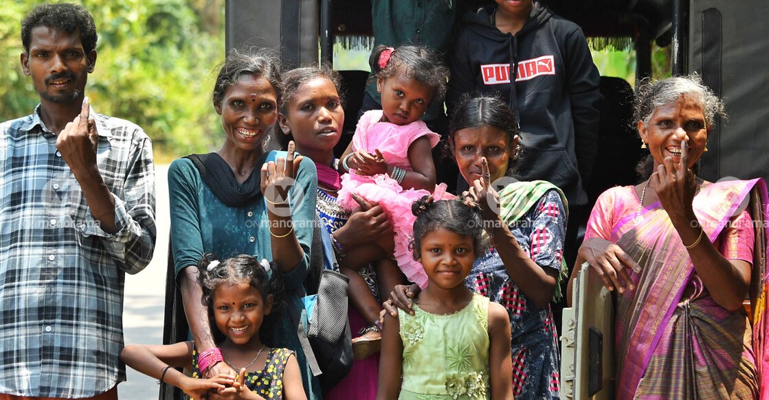 Tribespeople in Kerala, who cast their votes, posing with children. Photo: Manorama