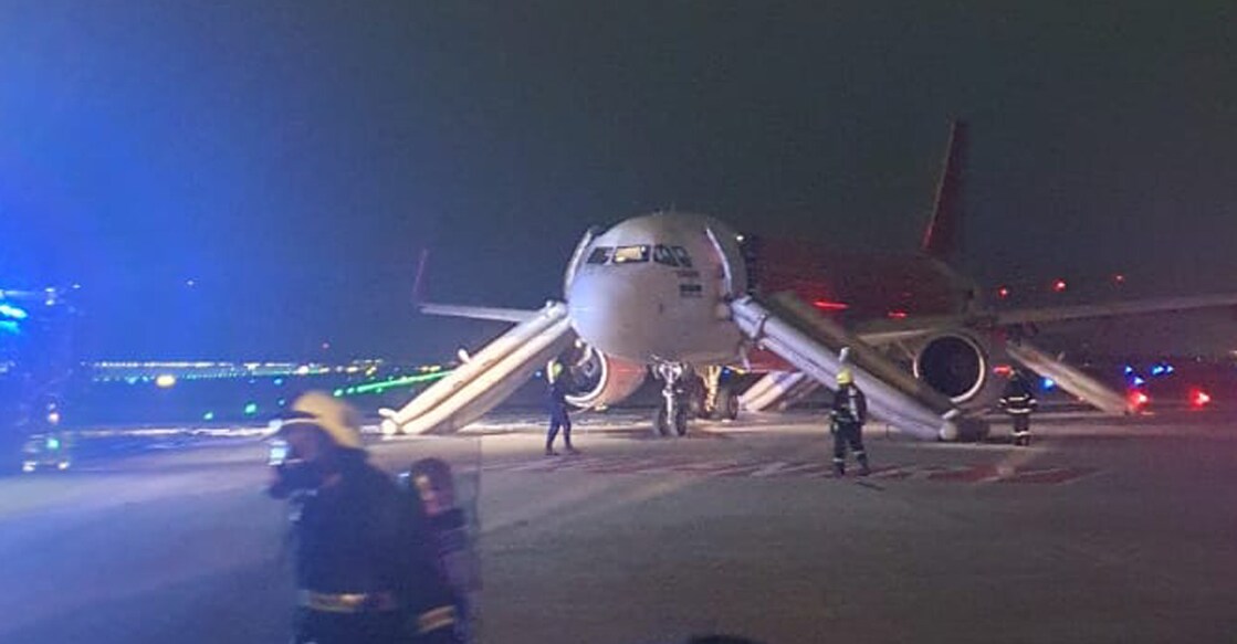 fire-scare-flight-kochi-bangalore The flight bound for Kochi made an emergency landing at Bangalore Saturday evening. Photo: Special arrangement