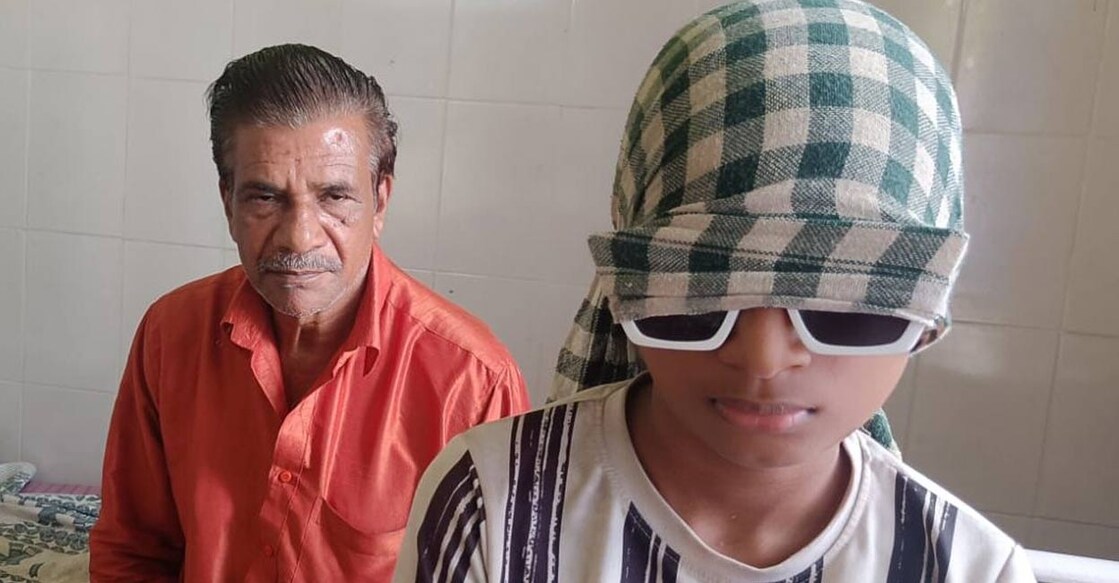 Ananthapadmanabhan, suffering from Congenital Myopia, with his grandfather Shashidhara Kurup at the Government District Ayurveda Hospital in Varkala. Photo: Special arrangement. 