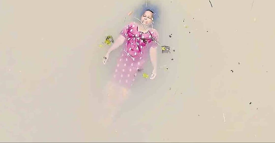 Shyamalamma floats in river. Photo: Special Arrangement