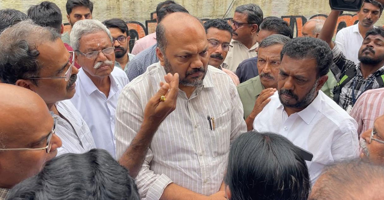 p-rajeev-rain-camp-kochi Minister P Rajeeve interacts with people of waterlogging-affected areas in Kochi on Thursday. Photo: I&PRD