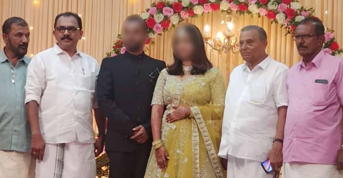 (From Left) Periya double murder case accused Balakrishnan, Congress Periya Mandalam president Pramod Periya, the bride and groom, and CPM leader and former MLA K Kunhiraman. Photo: Special Arrangement