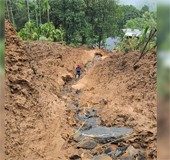 Landslide at Koorachundu in Kozhikode, huge parcel of land washed away, house under threat