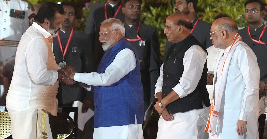 BJP MP Suresh Gopi greets Prime Minister Narendra Modi as party leaders Rajnath Singh and Amit Shah look on, at the swearing-in ceremony of the new Union government at Rashtrapati Bhavan, in New Delhi on June 9, 2024. Photo: PTI