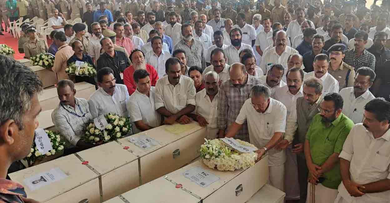 pinarayi-vijayan-kochi-airport-kuwait2 Kerala Chief Minister Pinarayi Vijayan pays respects to the Kuwait fire victims. Photo: Manorama