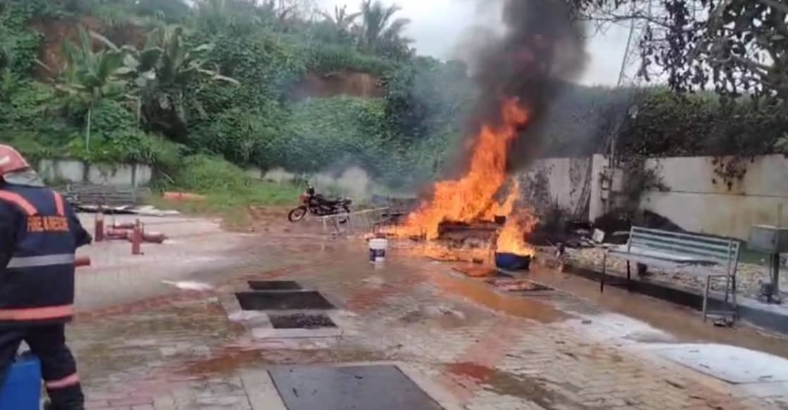 Fire erupted from drainage water mixed with fuel. Photo: Special Arrangement