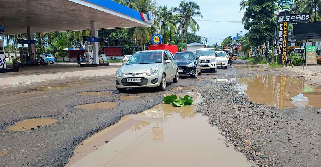 Vehicles proceed along the dilapidated Thrissur-Kuttippuram road. Photo: Special arrangement