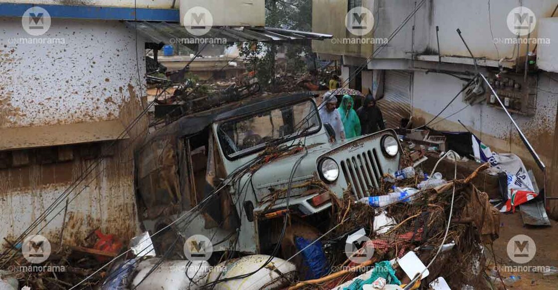 A jeep, the go-to ride in the high ranges, remains stuck in broken cables and debris at Chooralmala. Rescuers search for people inside a house on the School Road at Chooralmala that is filled with debris from the landslide. Photo: Albin Mathew