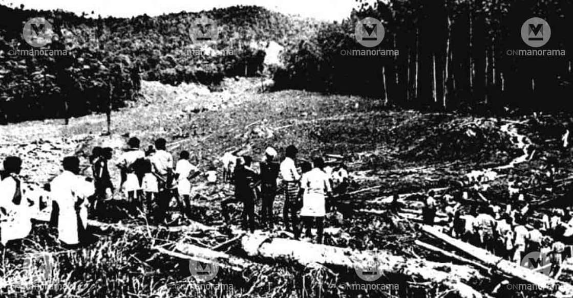 In this file photograph from 1984, people of Mundakkai watch across a vast area washed away by a landslide. Photo: Manorama archives