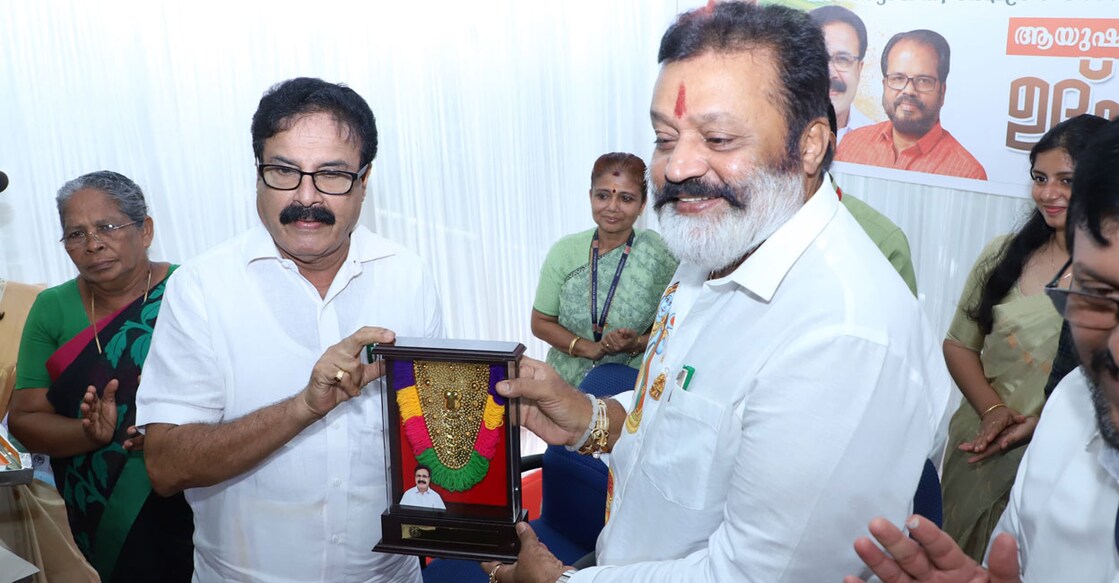 Thrissur Mayor M K Varghese with union minister Suresh Gopi during an event at Ayyanthole in Thrissur. Photo: Special arrangement