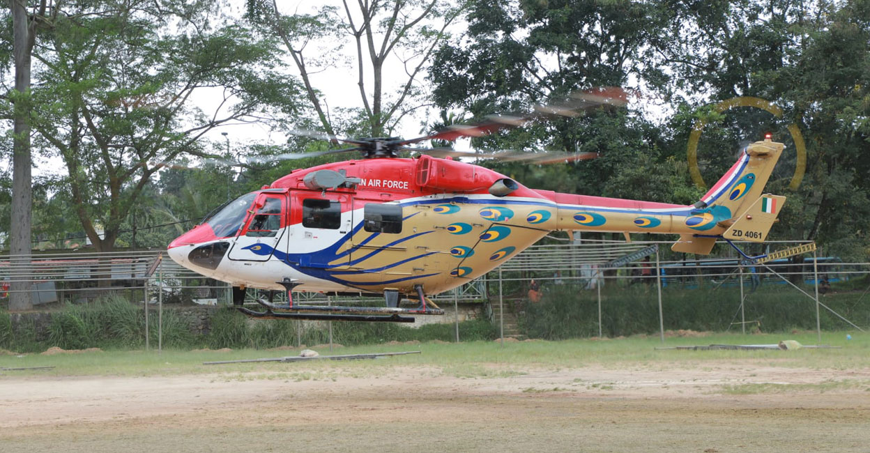 The search helicopter lands at St Mary's College Ground in Sulthan Bathery. Photo: PRD