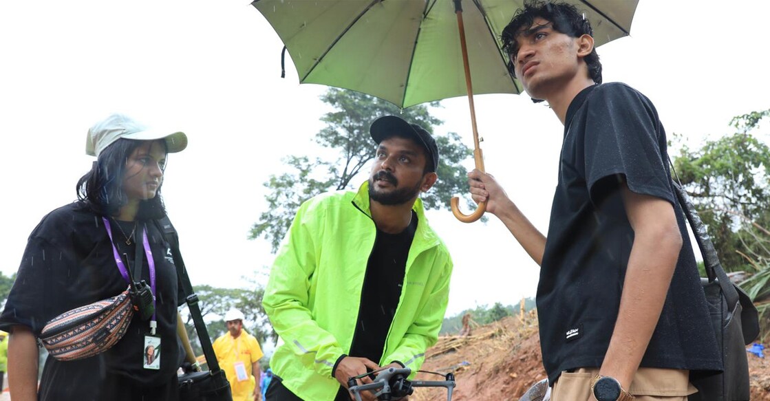 Arshif T (centre) and Sumayya Manaf of Drone Imagination at Mundakkai to map the disaster zone. Photo: Albin Mathew