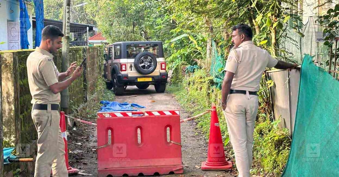 Police at the site of shooting. Photo: Manorama