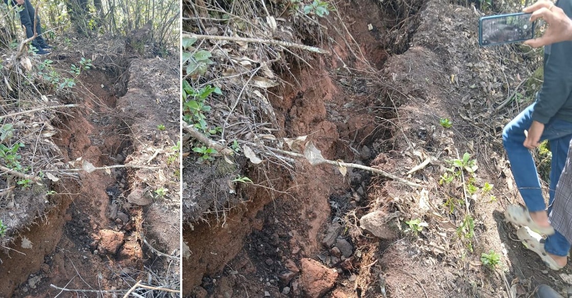 Residents inspect the cracks that appeared in the forest area in Irachilpara near Devikulam in Idukki. Photos: Special arrangement
