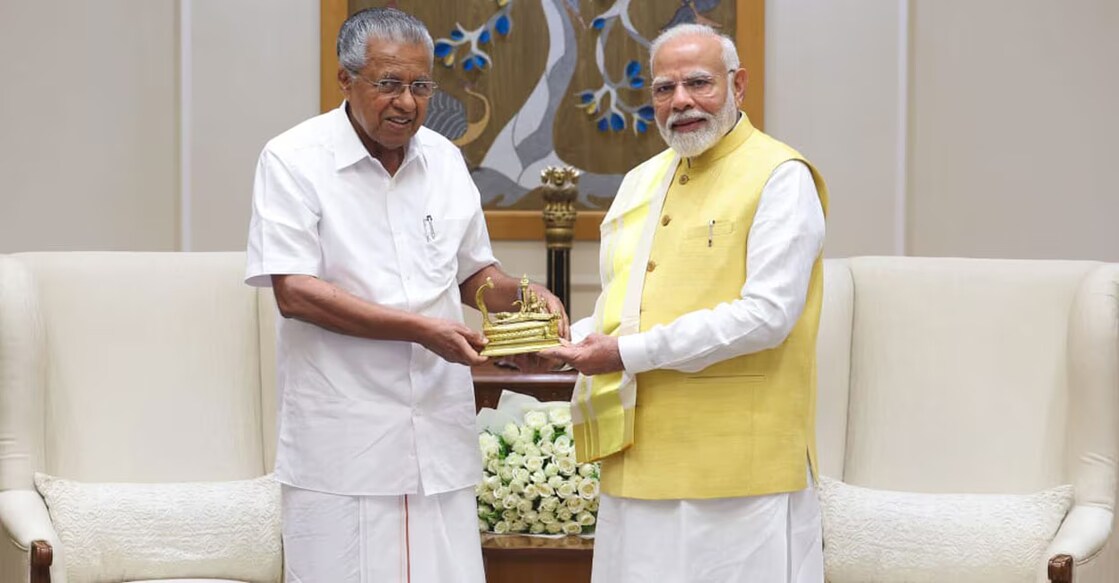 Chief Minister presenting an idol of Lord Sree Padmanabha Swamy to the Prime Minister. Photo: Manorama