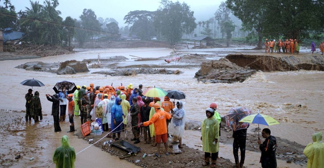 Members of rescue teams conduct rescue operation at a landslide site after multiple landslides. Photo: Reuters
