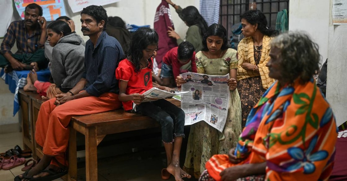 Survivors of the landslide rest at a relief camp in Wayanad. Photo: AFP
