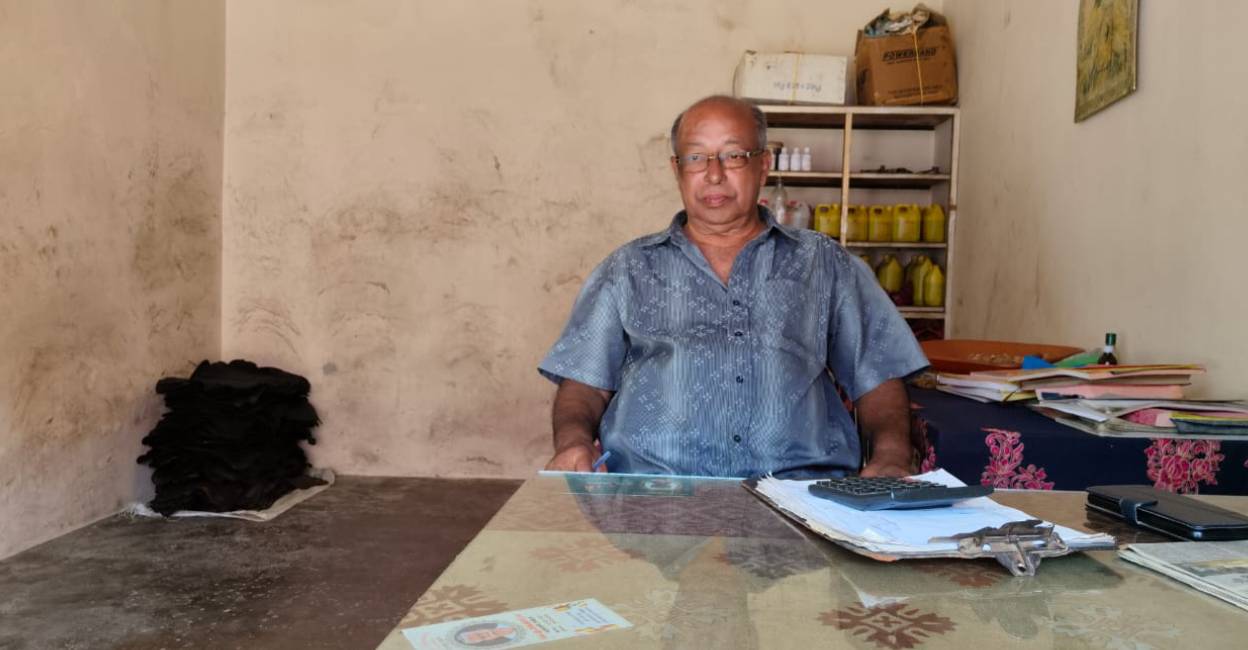 amboori-landslide-survivor C D Thomas in his rubber store at Amboori. Photo: Onmanorama