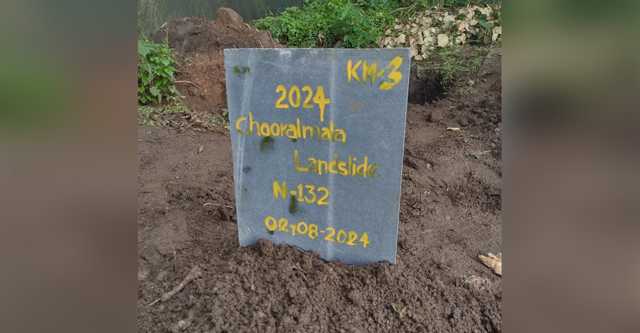 dna_landslide A small board is placed atop the grave carrying the DNA sample number. Photo: Special Arrangement.