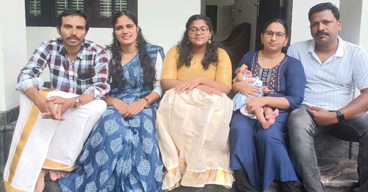 L-R: Aslam Thikkodi, Saleena Thikkodi, Vaiga, Asha and Shelly Vaiga. Shelly-Asha couple's one-and-a-half year old daughter Vamika in Asha's hands. Vaiga is Shelly's daughter. Photo: Special arrangement
