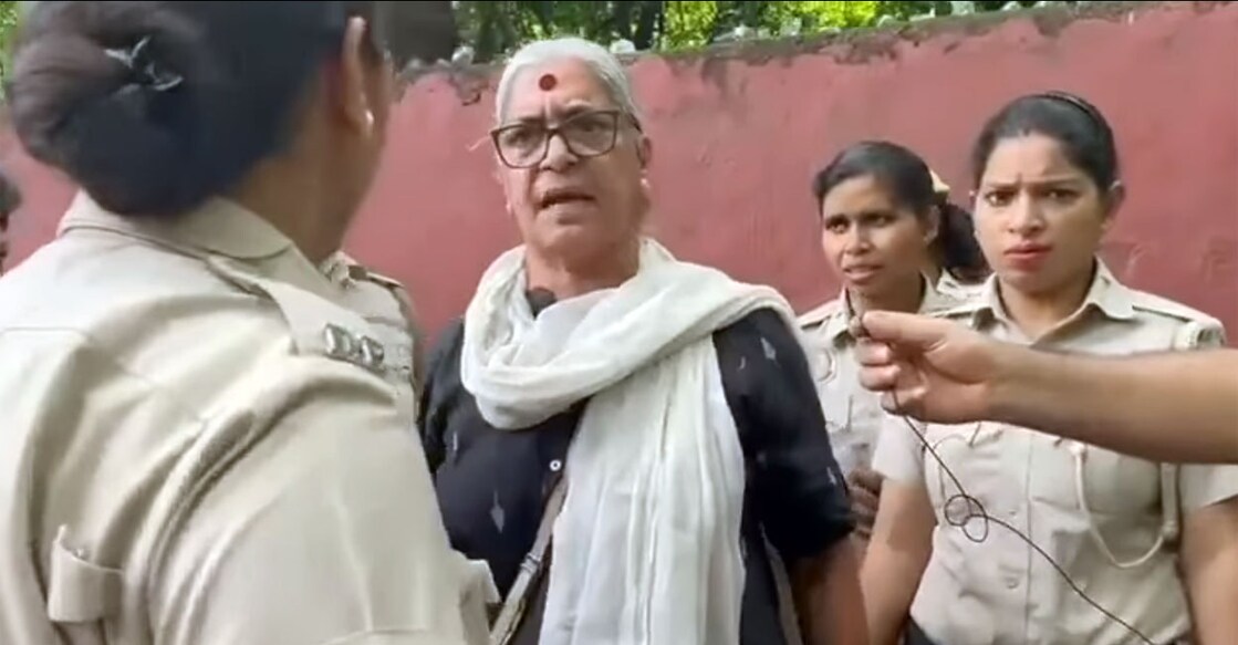 Annie Raja argues with women police officers during a protest march in Delhi on Friday. Photo: Screengrab/Facebook@anniedraja