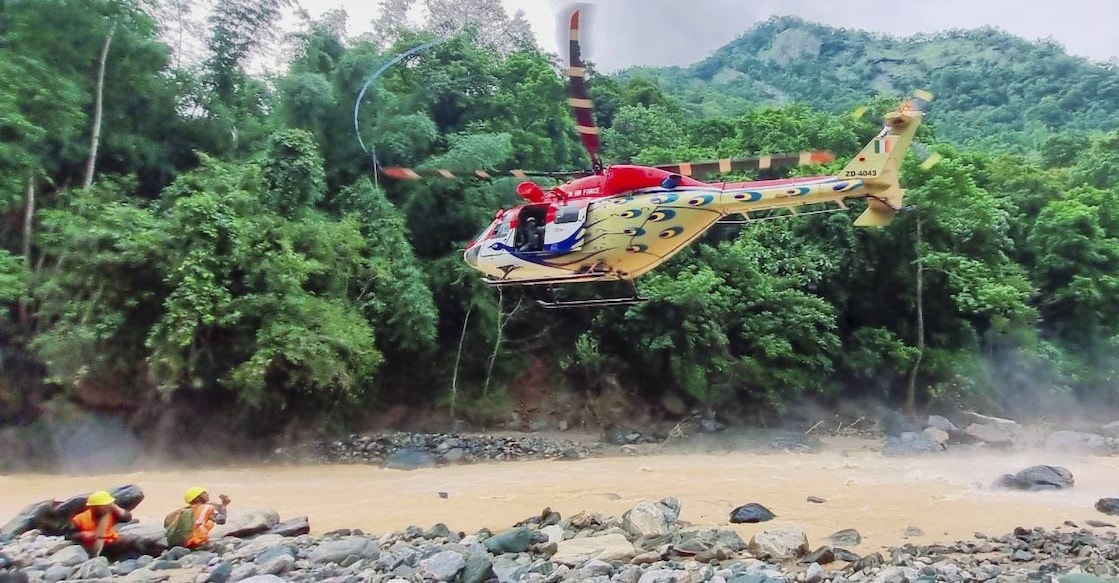 wayanad-search-army Teams of Special Operations Group and IAF, along with one Cadavar dog being airlifted during a search and rescue operation underway at a landslide-hit area in Wayanad. Photo: PTI
