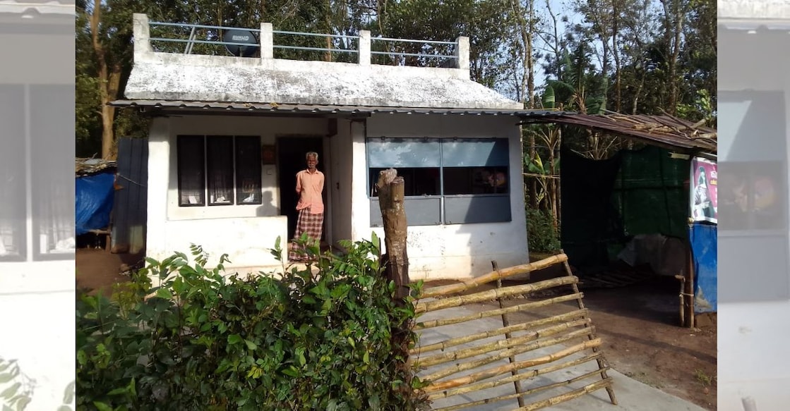 Surendran stands in front of his house in the Karunapuram Village in Idukki. Photo: Special arrangement