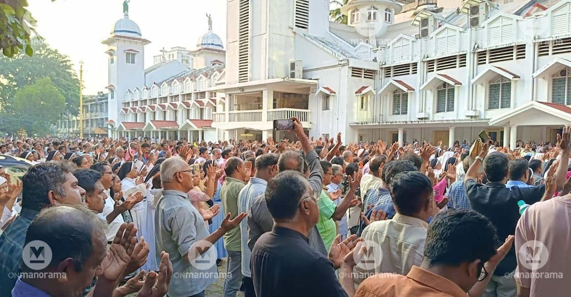 Believers attend the holy mass on the premises of the St Mary's Cathedral Basilica. Photo: Onmanorama