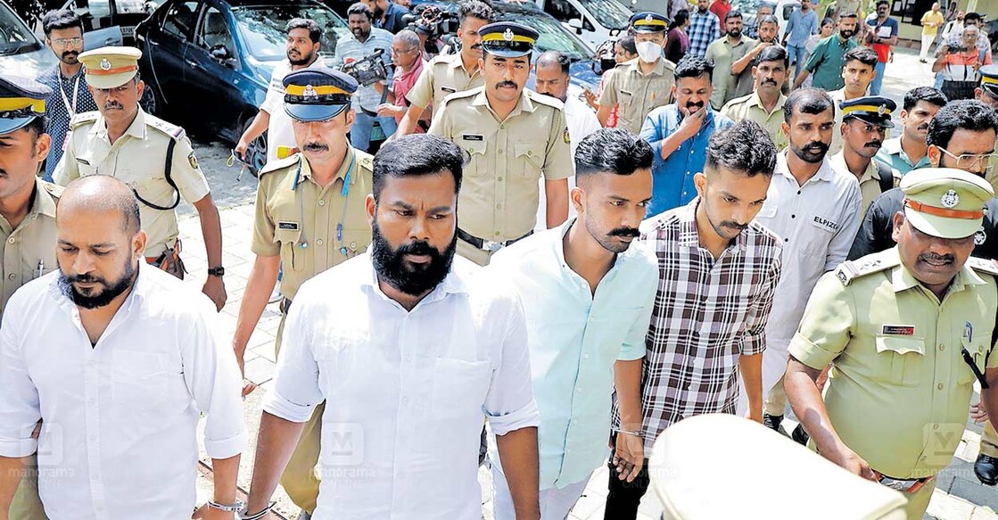 The accused convicted in the Periya double murder case, including fourth accused K Anil Kumar, eighth accused A Subeesh, seventh accused A Aswin, sixth accused R Sreerag, tenth accused T Ranjith, fifth accused G Gijin, second accused Saji George, and third accused KM Suresh, being escorted out of the Ernakulam CBI special court. Photo: Manorama