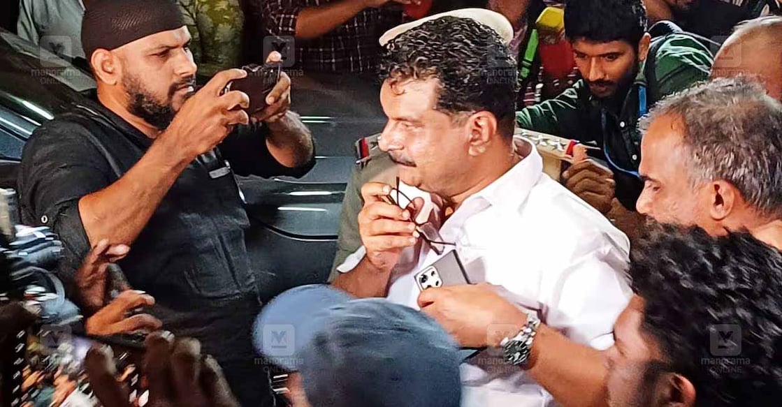 PV Anvar is being taken into custody. Photo: Manorama